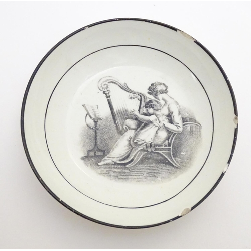 130 - Three small 19thC monochrome dishes, each depicting a mother and child playing. Approx. 4 1/4