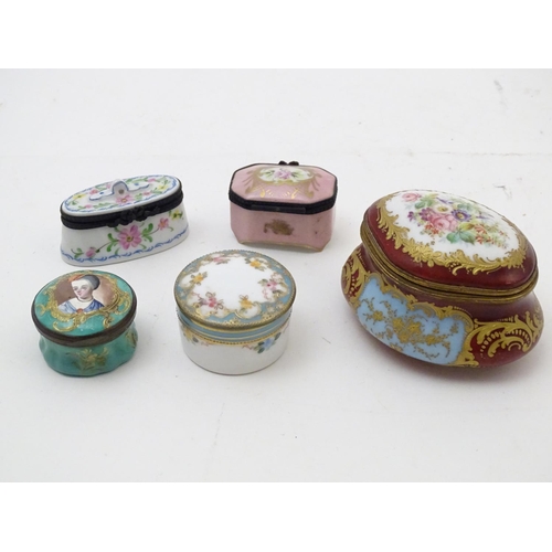 132 - Five assorted pill / patch boxes with floral detail, to include enamel and ceramic examples. Makers ... 