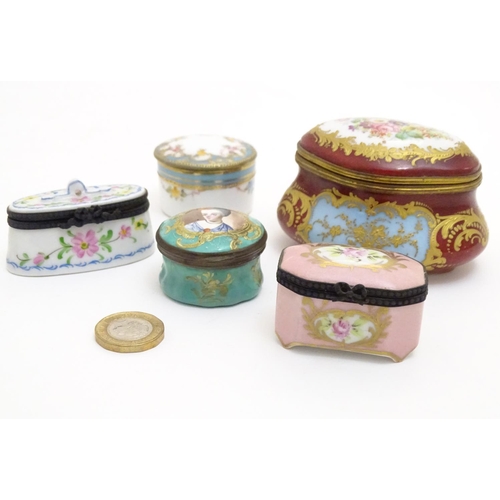 132 - Five assorted pill / patch boxes with floral detail, to include enamel and ceramic examples. Makers ... 