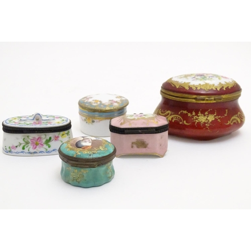 132 - Five assorted pill / patch boxes with floral detail, to include enamel and ceramic examples. Makers ... 