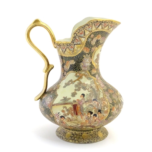 14 - An Oriental jug / ewer with a bulbous body decorated with panels depicting ladies in a garden terrac... 