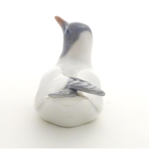 148 - A Royal Copenhagen model of a seagull bird, model no. 1468. Marked under. Approx. 2 1/4