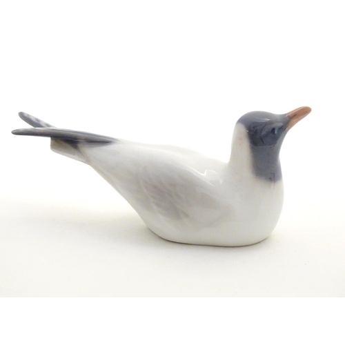 148 - A Royal Copenhagen model of a seagull bird, model no. 1468. Marked under. Approx. 2 1/4