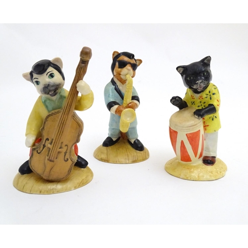 151 - Three Beswick models from the Cats Chorus series, comprising Catwalking Bass, model no. CC 6, One Co... 