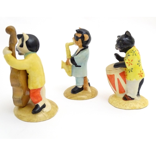 151 - Three Beswick models from the Cats Chorus series, comprising Catwalking Bass, model no. CC 6, One Co... 