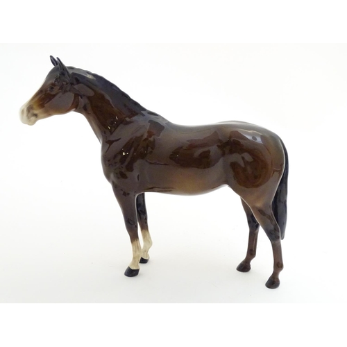 155 - A Beswick Highland brown Bois Roussel race horse, model no. 701, designed by Arthur Gredington. Mark... 