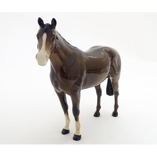 155 - A Beswick Highland brown Bois Roussel race horse, model no. 701, designed by Arthur Gredington. Mark... 