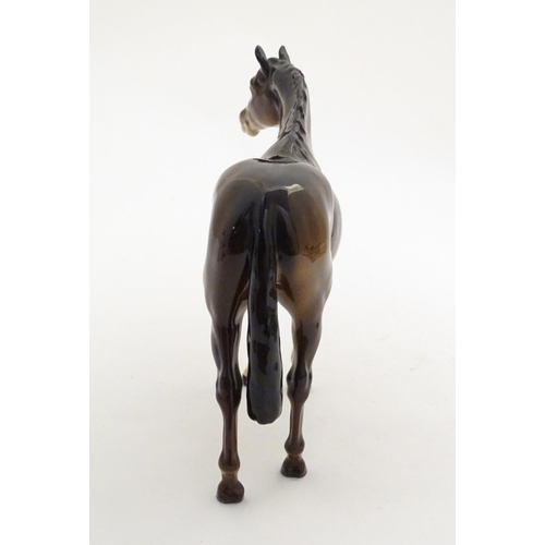 155 - A Beswick Highland brown Bois Roussel race horse, model no. 701, designed by Arthur Gredington. Mark... 