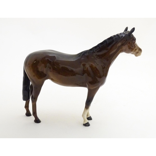 155 - A Beswick Highland brown Bois Roussel race horse, model no. 701, designed by Arthur Gredington. Mark... 