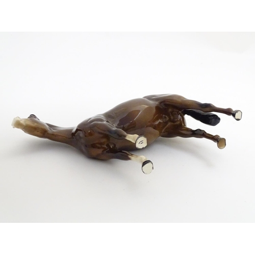 155 - A Beswick Highland brown Bois Roussel race horse, model no. 701, designed by Arthur Gredington. Mark... 