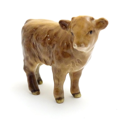 157 - A Beswick Highland calf, model no. 1827D, designed by Arthur Gredington. Marked under. Approx. 3