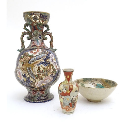 180 - Three assorted Oriental items comprising a large Japanese vase with twin handles decorated with flow... 