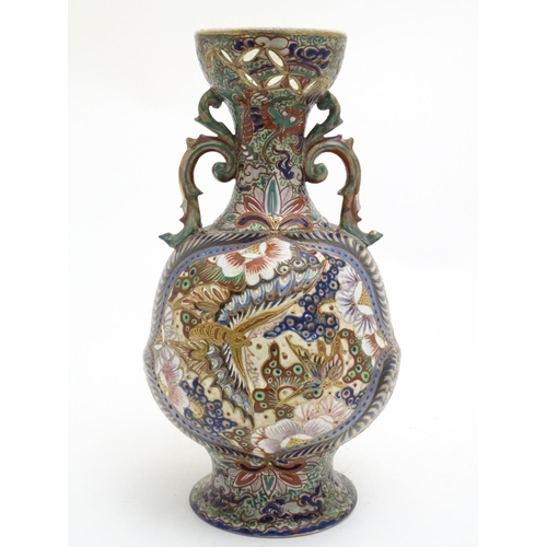 180 - Three assorted Oriental items comprising a large Japanese vase with twin handles decorated with flow... 