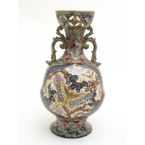 180 - Three assorted Oriental items comprising a large Japanese vase with twin handles decorated with flow... 