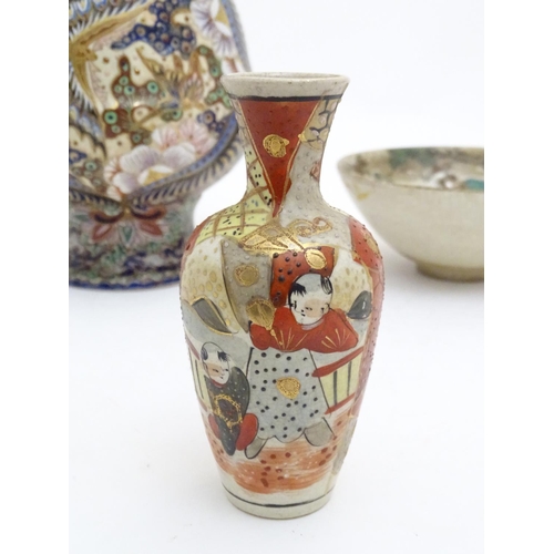 180 - Three assorted Oriental items comprising a large Japanese vase with twin handles decorated with flow... 