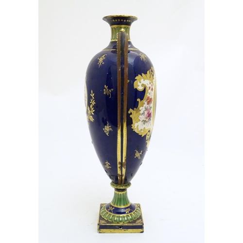 183 - A Royal Bonn vase of baluster form with twin handles, decorated with a portrait of a woman within a ... 