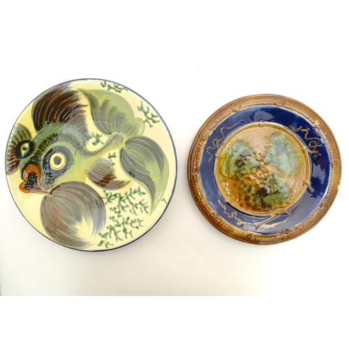 196 - A Spanish Puigdemont majolica slipware plate / charger with fish and coral decoration. Signed under.... 