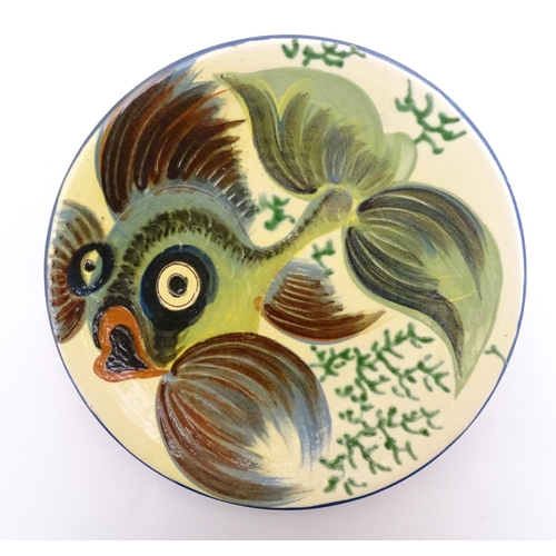 196 - A Spanish Puigdemont majolica slipware plate / charger with fish and coral decoration. Signed under.... 
