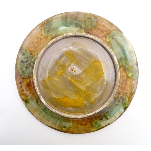 196 - A Spanish Puigdemont majolica slipware plate / charger with fish and coral decoration. Signed under.... 
