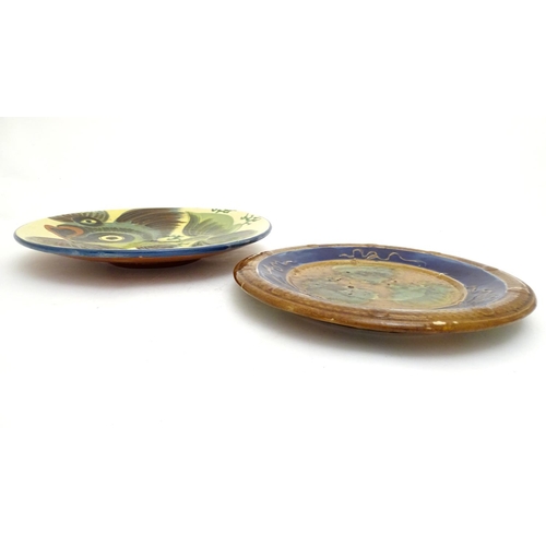 196 - A Spanish Puigdemont majolica slipware plate / charger with fish and coral decoration. Signed under.... 