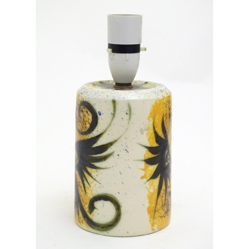 202 - A retro studio pottery lamp base with phoenix decoration by Celtic pottery, Newlyn, Cornwall. Approx... 