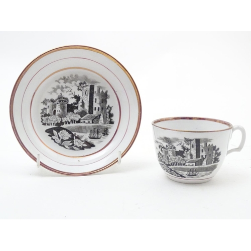 66 - A 19thC tea cup and saucer with monochrome transfer decoration depicting a river landscape with a sh... 