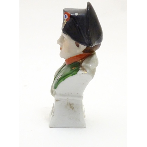 68 - A small Continental bust modelled as Emperor Napoleon. Marked under. Approx. 3