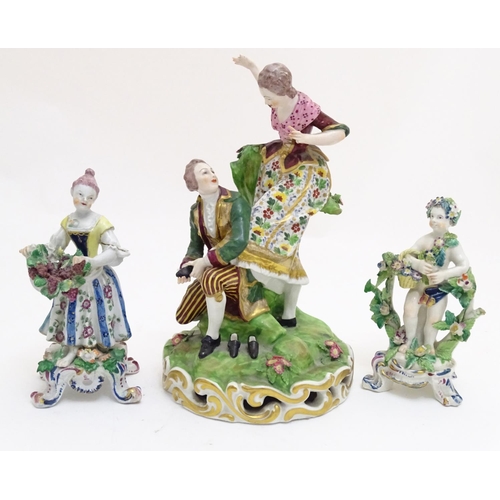 84 - A Derby porcelain figural group with two figures, a kneeling gentleman fitting a slipper on a young ... 