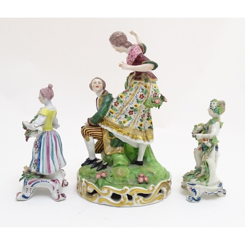 84 - A Derby porcelain figural group with two figures, a kneeling gentleman fitting a slipper on a young ... 