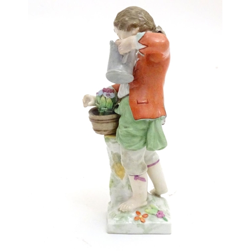 86 - A Continental porcelain figure modelled as a boy with a watering can tending to a pot of flowers. Ma... 