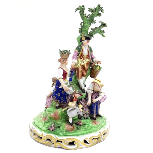 87 - A large Derby porcelain figural group garden scene, depicting men, women and children tending to and... 