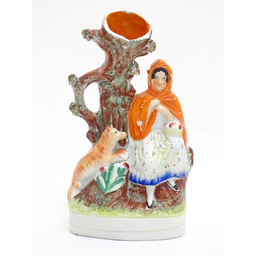 90 - A Staffordshire flatback bud vase depicting Little Red Riding Hood in a woodland scene with a wolf. ... 