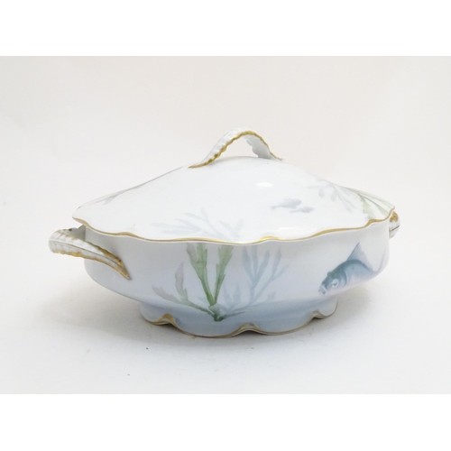 92 - A late 19thC Rosenthal oval scallop shaped tureen with a lobed gilt edged rim, decorated with underw... 