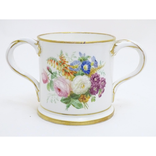 93 - A 19thC loving cup with hand painted floral display to one side and gilt inscription 'Thomas Blackwe... 