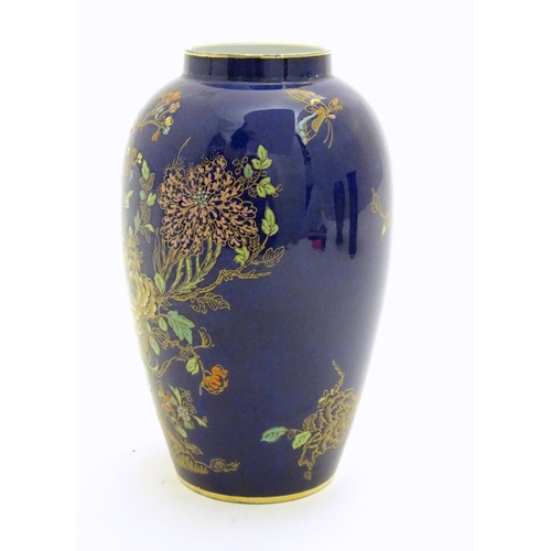 97 - A Wiltshaw and Robinson Carlton Ware baluster vase decorated in the pattern Rockery and Pheasant, wi... 