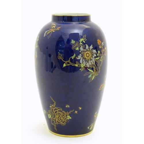 97 - A Wiltshaw and Robinson Carlton Ware baluster vase decorated in the pattern Rockery and Pheasant, wi... 