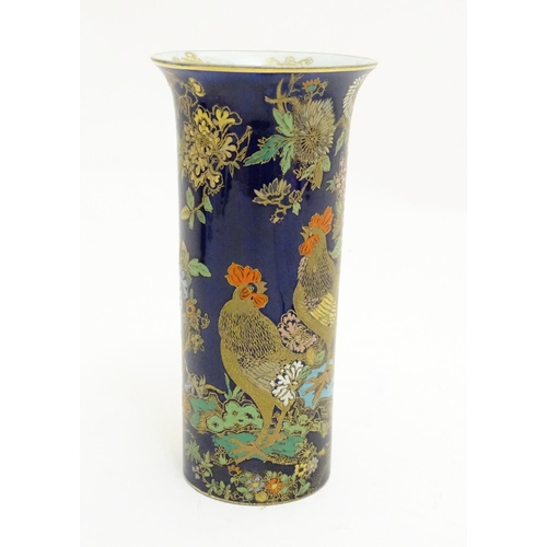 98 - A Wiltshaw and Robinson Carlton Ware cylindrical vase decorated with cockerels / roosters in a lands... 