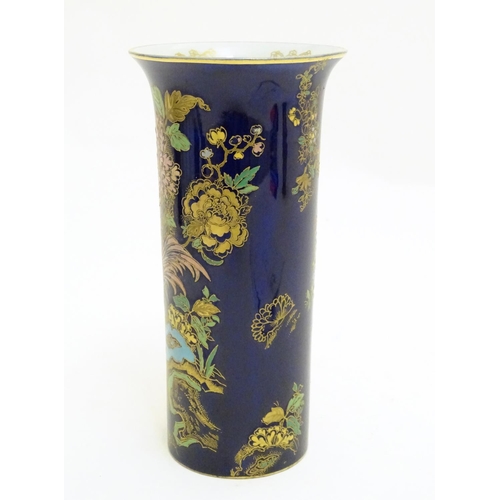 98 - A Wiltshaw and Robinson Carlton Ware cylindrical vase decorated with cockerels / roosters in a lands... 