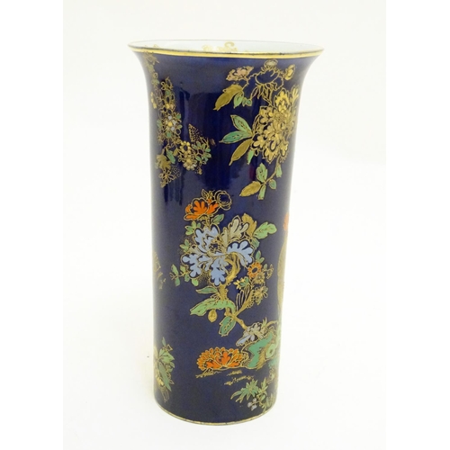 98 - A Wiltshaw and Robinson Carlton Ware cylindrical vase decorated with cockerels / roosters in a lands... 