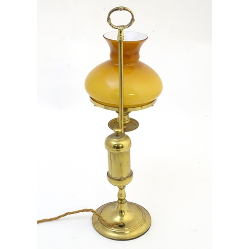 1520 - An Argand / quinquet style table lamp now converted to electricity with later Bakelite fitting/ Appr... 