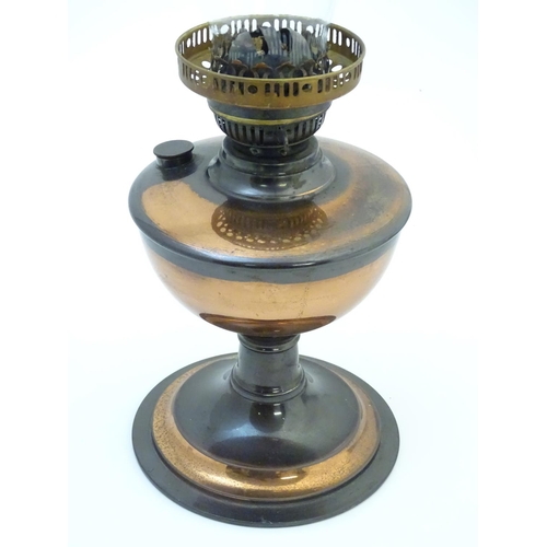 1522 - A late 19thC / early 20thC oil lamp with  glass chimney. Approx 19 1/2