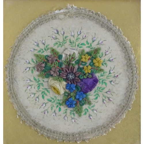 1760 - A pair of Victorian embroidered roundels with central floral relief composition, hand painted silk f... 