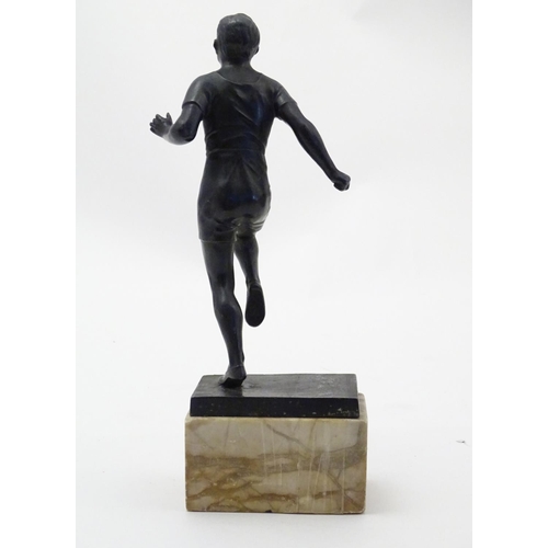 845 - A 20thC cast model of a man running on a marble base. Approx. 10 3/4