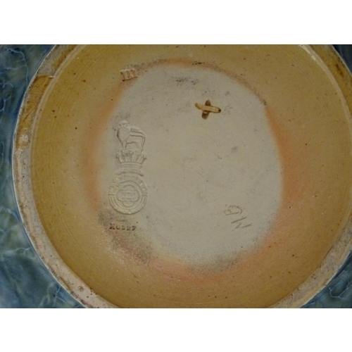 114 - A Royal Doulton stoneware bowl with banded autumnal foliate leaf decoration on a mottled blue ground... 