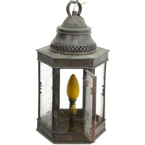 1528 - An Arts and Crafts pendant light of copper lantern form with pierced gallery with heart detail with ... 