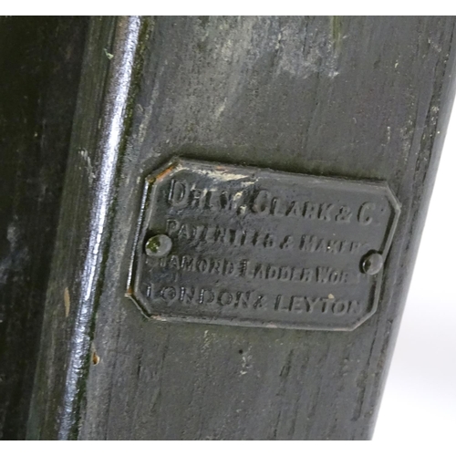 1537 - Salvage & Architectural Antiques: a green painted extending ladder, bearing label for Drew Clark & C... 