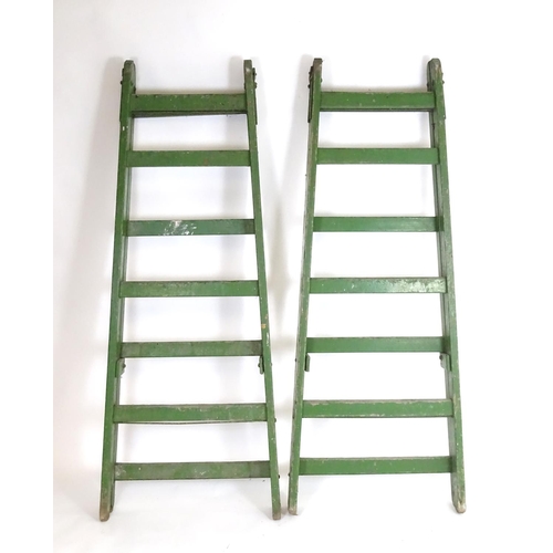 1538 - Salvage & Architectural Antiques: two c1940s large industrial step ladders, in green painted finish ... 