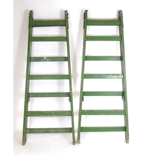 1538 - Salvage & Architectural Antiques: two c1940s large industrial step ladders, in green painted finish ... 