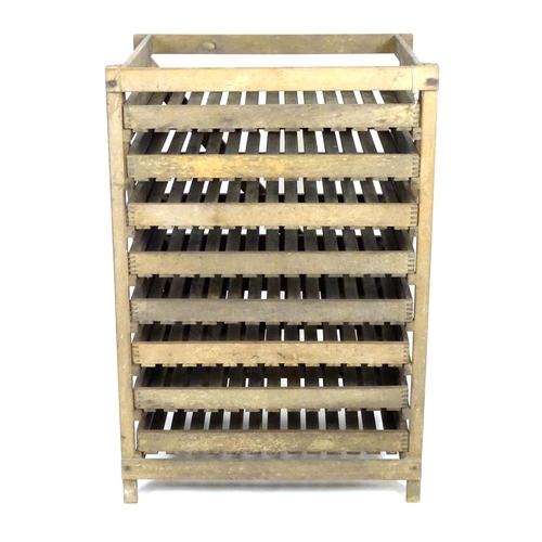 1540 - Salvage & Architectural Antiques: a mid 20thC apple crate storage unit, with eight tiers, 36