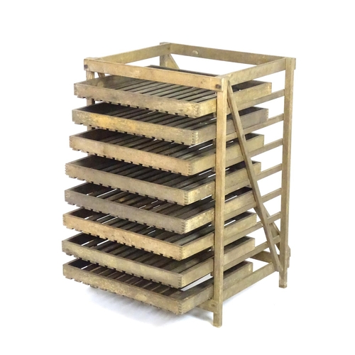 1540 - Salvage & Architectural Antiques: a mid 20thC apple crate storage unit, with eight tiers, 36